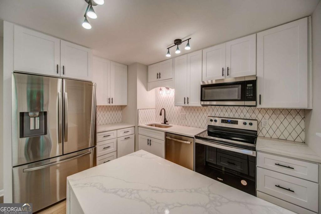 Photo of 4734 N Springs Road NW, Kennesaw, GA 30144 (MLS # 10715228)