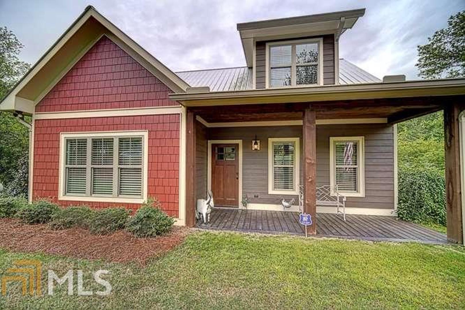 A true craftsman, cottage styled home in the heart of the Blue Ridge Mountains! A layout on .39 acres that immediately catches your eye - beautiful landscaping, accent wall, & paved driveway that leads to the detached 2 car garage in the back. A picturesque back porch with a nice grilling environment, lounging & shaded areas, plus a firepit spot under the lights is what greets you. Head inside to see the laundry room on main that could act as mudroom & the modern touches throughout such as the sliding barn door on the half bath. Open floor plan that combines the living room & kitchen with cozy dining area off of it. Master BR on main with double vanity & separate shower in the BA. 2 spacious rooms upstairs with shared BA. Conveniently located less than 5 miles from the popular DT Blue Ridge!