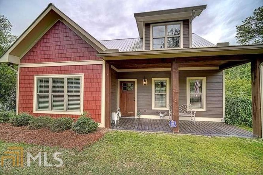 A true craftsman, cottage styled home in the heart of the Blue Ridge Mountains! A layout on .39 acres that immediately catches your eye - beautiful landscaping, accent wall, & paved driveway that leads to the detached 2 car garage in the back. A picturesque back porch with a nice grilling  environment, lounging & shaded areas, plus a firepit spot under the lights is what greets you. Head inside to see the laundry room on main that could act as mudroom & the modern touches throughout such as the sliding barn door on the half bath. Open floor plan that combines the living room & kitchen with cozy dining area off of it. Master BR on main with double vanity & separate shower in the BA. 2 spacious rooms upstairs with shared BA. Conveniently located less than 5 miles from the popular DT Blue Ridge!