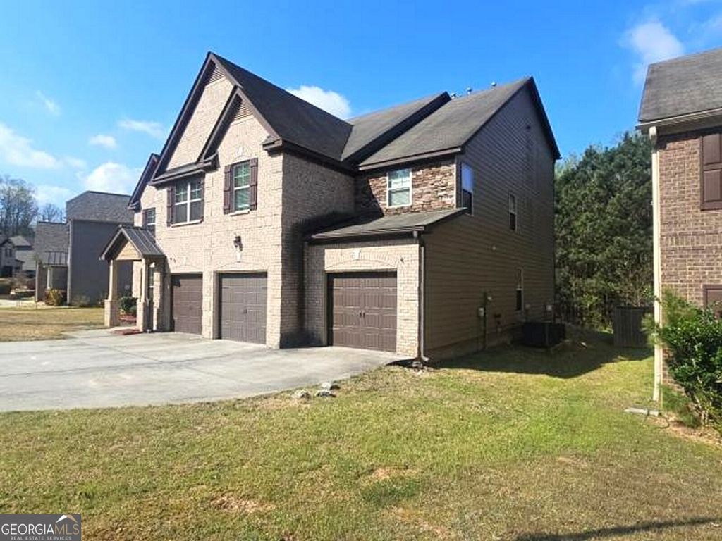 Photo of 811 Lorrimont Lane, Fairburn, GA 30213 (MLS # 10728040)