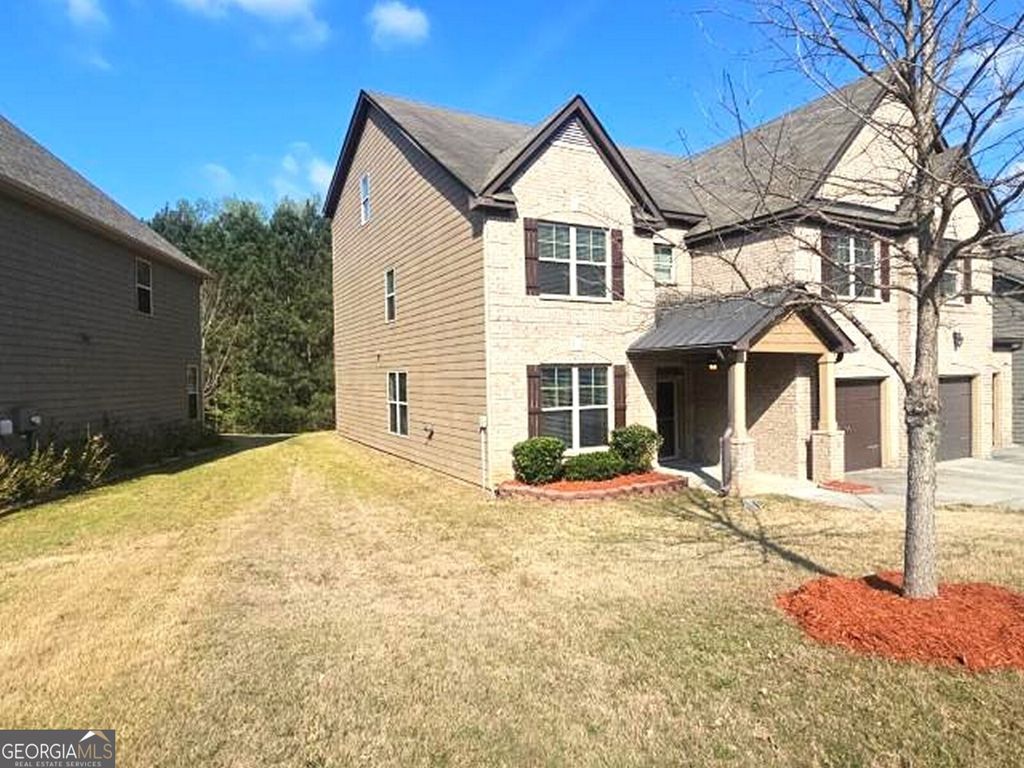 Photo of 811 Lorrimont Lane, Fairburn, GA 30213 (MLS # 10728040)