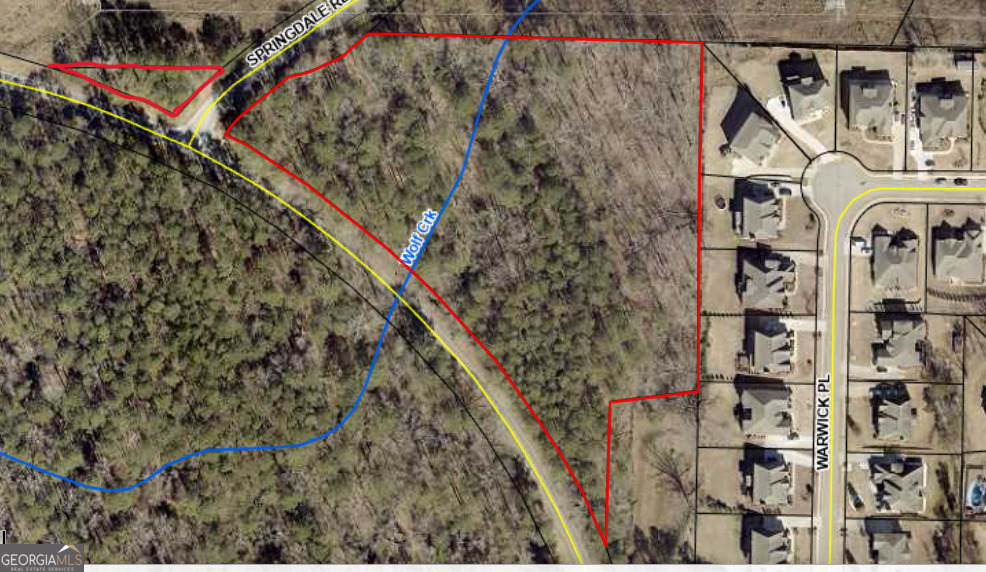This picturesque, natural beauty has a flowing creek (Wolf Creek) that splits the high and low portions of the lot. Just imagine sitting on the patio/deck of your beautiful, newly built home with a view of the flowing creek where you can hear the water trickle over the rocks. The high portion is about three acres, so you can build more than one home or create another parcel if you like - can build on a basement or slab depending on where you decide to build on the lot. The low portion is perfect for a picnic/event area, a small campground, or leave it as the natural beauty it is for your viewing pleasure. **The possibilities are endless! **In the East Lake and Union Grove School District. **Convenient to all your necessities (e.g. Kroger, Publix, restaurants). **8 minutes from I-75. **The survey and soil test for septic are provided. **Use 1100 Brannan, if 1150 Brannan won't work on the GPS. On the corner of Springdale Rd. and Brannan, beside the Providence Harbor subdivision. There are two driveways, one for each low/high portion. **No sign. Call 404-910-3574 for showings/questions.