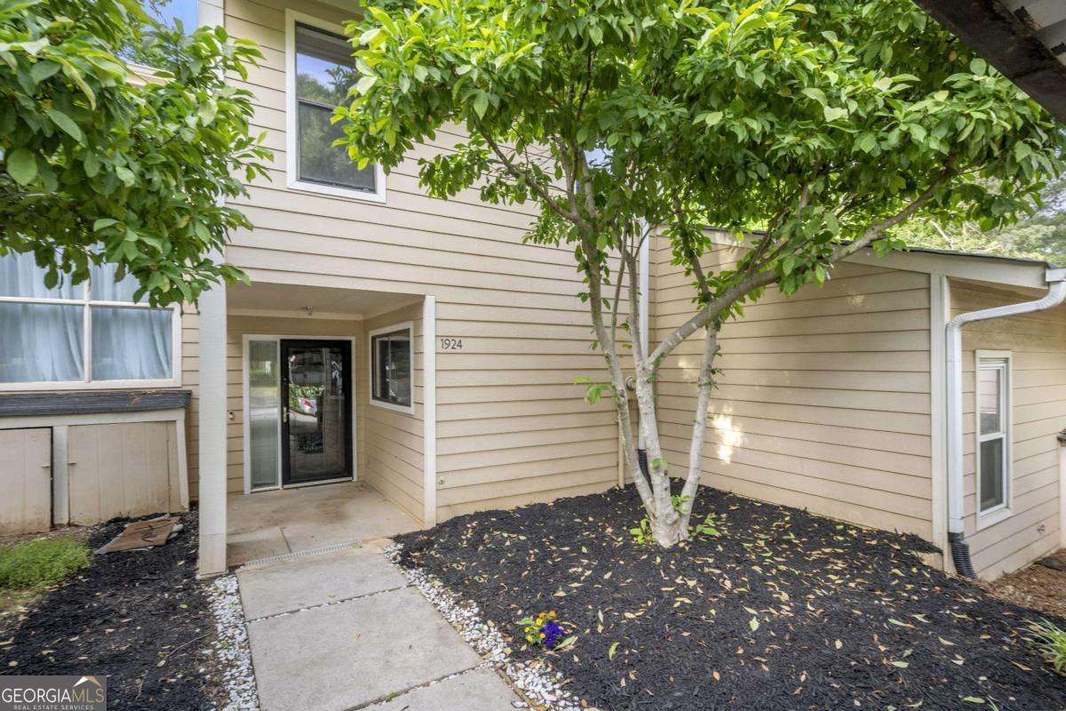 Tucked away in a serene, well-kept community, this beautifully updated condo offers a rare opportunity in one of Atlanta's most sought-after areas. Inside, gleaming maple hardwood floors and an open-concept layout create a welcoming space that balances comfort with style. A sun-filled room just off the main living area provides the perfect spot for morning coffee, a reading nook, or evening wind-down. The kitchen boasts sleek tile flooring, stainless steel appliances, and generous counter space-ideal for everyday cooking or entertaining. The spacious primary suite features a private bath, while two additional bedrooms provide flexibility for guests, a home office, or a fitness room. Recent updates include a 2-car carport, fresh exterior paint, and a newer roof for peace of mind. Enjoy community amenities such as a swimming pool and tennis courts, all while being just minutes from Emory, Buckhead, and Atlanta's premier dining and shopping destinations.