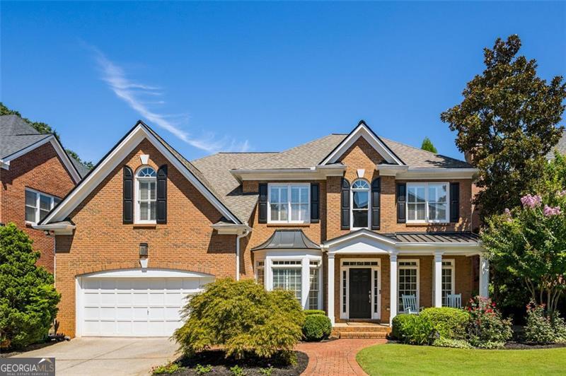 Nestled on a peaceful cul de sac, this brick residence offers timeless curb appeal & generous living space in sought-after Brookhaven Heights. A welcoming front porch greets you, while inside, sunlight fills the home, creating an inviting atmosphere across every level. A spacious two-story living area flows effortlessly into the gourmet kitchen. Formal living and dining rooms, a home office/library with built-in shelving, a powder room, and a spacious entertainment deck balancing everyday function with elegant detail. The upper level is highlighted by a luxurious primary suite with tray ceiling, sitting area, and a spa-inspired bath featuring dual vanities, soaking tub, glass shower, and a custom walk-in closet. The newly finished terrace level expands the home's possibilities with abundant space for entertainment or extended living. Highlights include a media room, kitchen, fitness area, and full guest suite. Outside you'll find a generous covered stone patio, fenced yard and two car garage.