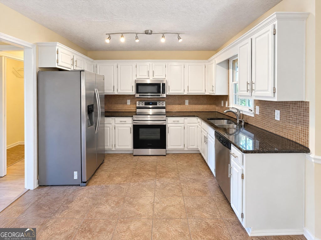Photo of 1454 Milford Court S, Marietta, GA 30008 (MLS # 10880480)