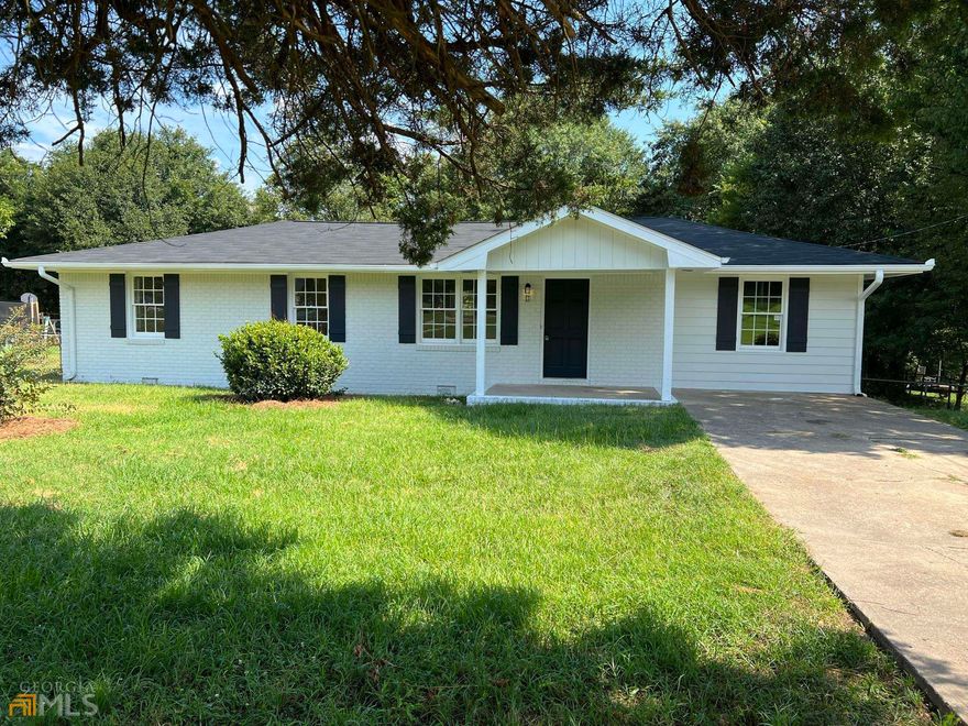 Back on the market and priced to sell!!!  Adorable, freshly renovated 4 bedroom 2 bath ranch for sale just between Winder and Bethlehem. This like-new home boasts a modern painted brick exterior with custom made board and batten shutters.  There is a large solid stained deck overlooking the fenced in, wooded back yard complete with lots of outdoor storage. Access to the deck is provided by the double French doors just off the kitchen/ breakfast area.     This home offers countless new upgrades which will offer peace of mind for years to come, including brand new roof, faucets, granite countertops, stainless steel appliances, bathroom fixtures, subway tile, hardwood LVP flooring and so much more!  Additionally, the HVAC system was recently installed by the previous owners and comes with a 10 year warranty.  Plenty of room to entertain in this open concept kitchen with oversized, granite bar next to the large laundry room. The spacious, well-lit fourth bedroom is perfect for an in law suite, man cave or office space as it's separated from the other bedrooms and has direct access to the common areas including laundry, kitchen and living room.    This home even has a whole house attic fan that provides a stiff breeze in every room for those days and nights when it's not quite cold or hot enough to use the central HVAC system.    This property is located less than a mile from the restaurants, large retail shops and amenities of the Gateway/ Exchange development and is just a couple minutes from Hwy 316. Unlike most areas near the bustling and densely populated Hwy 81/316 corridor, this home is tucked away on a quiet part of Harvey Lokey Rd. with larger residential land lots.  That means a low county tax bill, no HOA, and all the benefits of being close to the things you need without the hassle of the traffic and noise.  The best of both worlds!