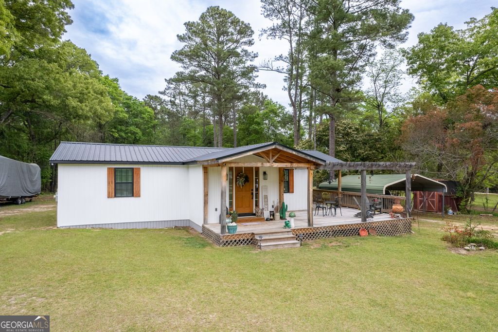 Photo of 1119 Lower Hartley Bridge Road, Byron, GA 31008 (MLS # 10726457)