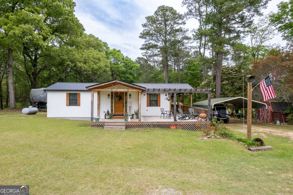 Photo of 1119 Lower Hartley Bridge Road, Byron, GA 31008 (MLS # 10726457)
