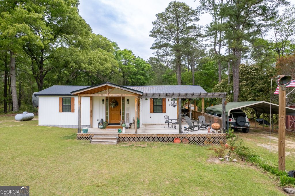 Photo of 1119 Lower Hartley Bridge Road, Byron, GA 31008 (MLS # 10726457)