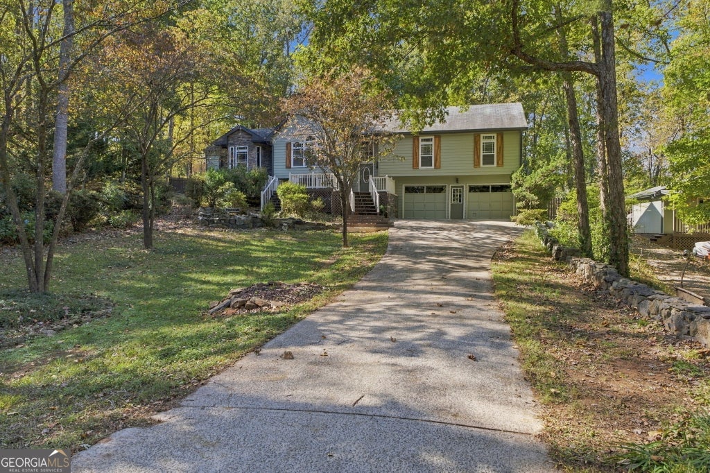 Photo of 605 Hickory Creek Lane, Woodstock, GA 30188 (MLS # 10880034)