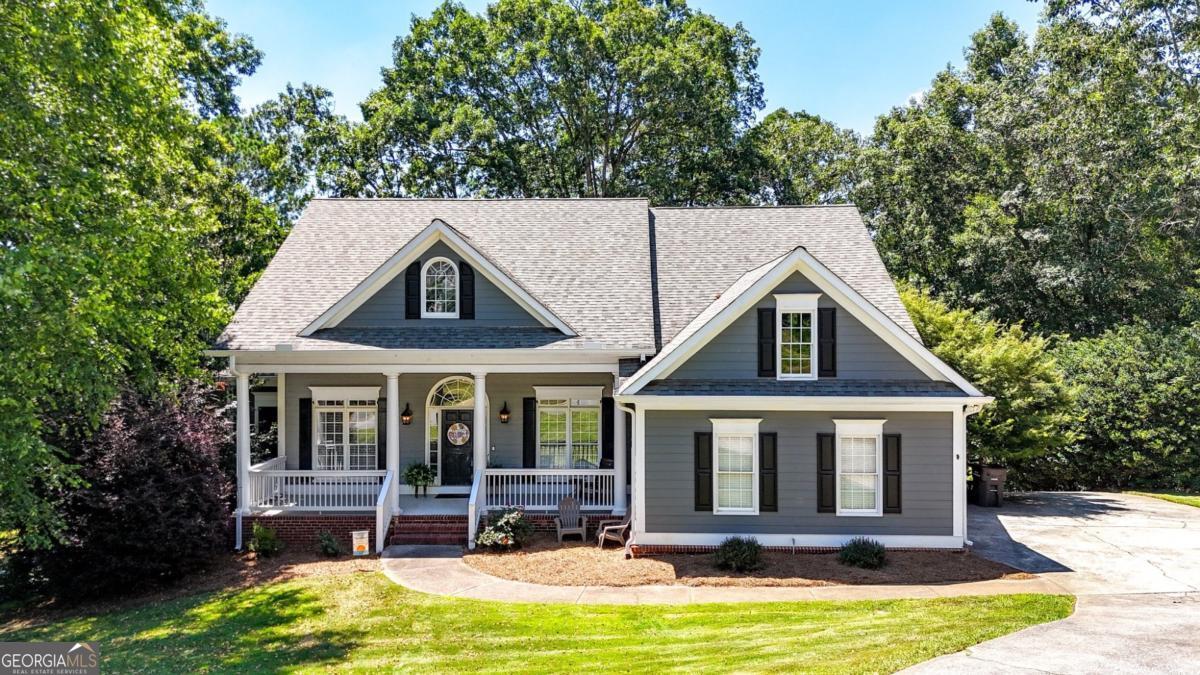 A craftsman style ranch that is 2 homes in one and ready for immediate occupancy! This home blends timeless charm with contemporary updates. The main level boasts a welcoming family room with built-in shelves, abundant storage, beautiful hardwoods, and a cozy fireplace. The separate dining room is ideal for entertaining, and the home office with French doors allows for a quiet workspace. The well-appointed kitchen features granite counters, a gas range, ample cabinets and an eat in breakfast room. The primary suite includes a newly renovated ensuite bath with a double vanity, custom soaking/jetted tub and walk-in shower. Two additional bedrooms share a large secondary bath and come with walk-in closets. The finished basement enhances your living options with a full "second home". Its own exterior entrance, an additional one-car garage, full kitchen, living room/ dining room, second primary suite including a second ensuite bath and large walk-in closet, a storm shelter/storage space. The lower level is rounded out with an additional office/bonus/game room, second bedroom and full bath, its own laundry room and private outdoor screened patio. This home is perfect for in-laws, adult children/teen suite, or as a potential rental opportunity! Minutes to downtown Cartersville, this home is in Cartersville City school district and in the well-established Parkside at Mission Estates swim/tennis community.