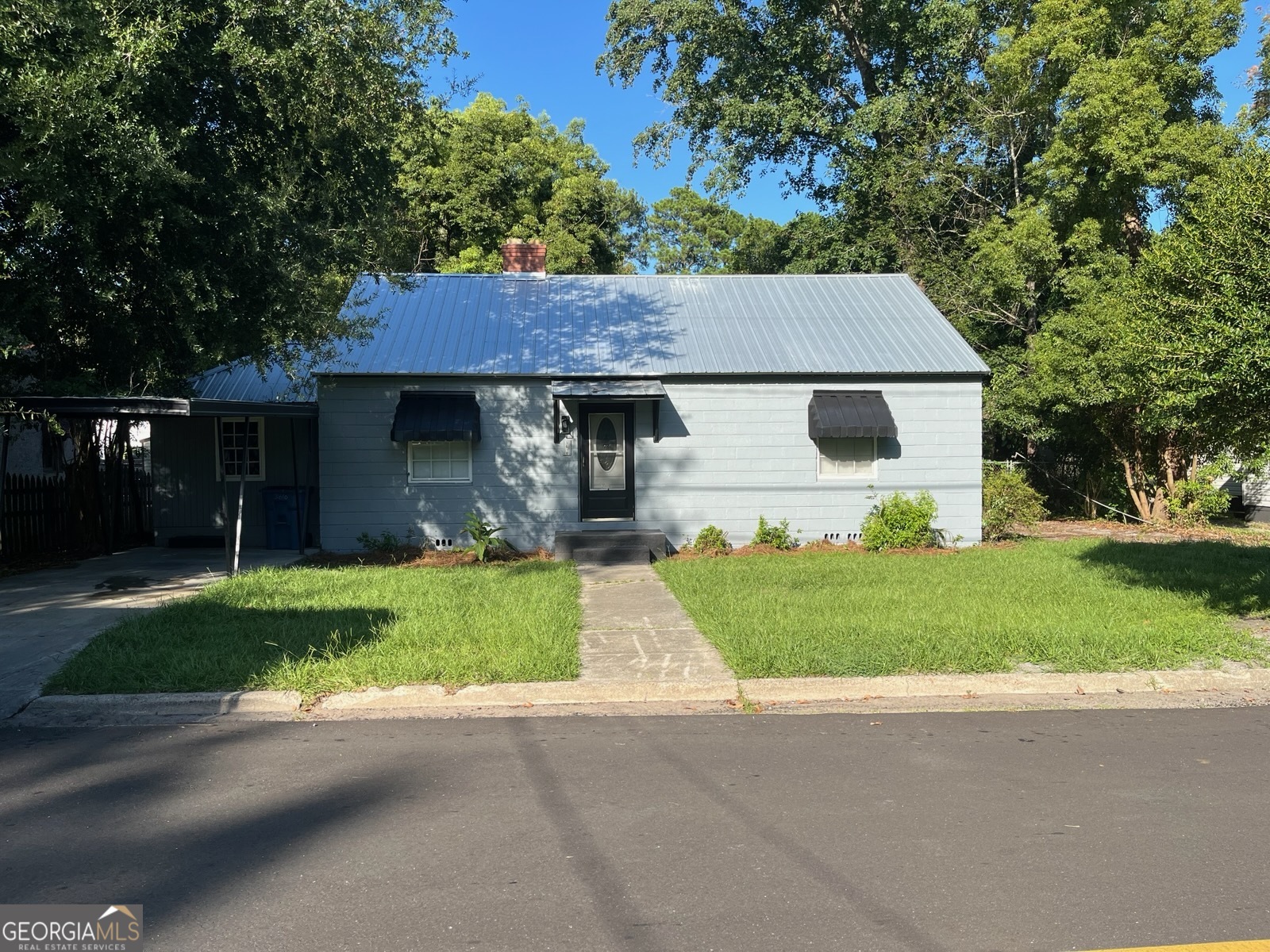 This move-in ready home has been updated. Enjoy peace of mind with all new electrical wiring, a 200-amp panel box, and updated plumbing throughout. Freshly painted inside and out, this home boasts a brand-new kitchen featuring modern cabinets and new countertops. The bathroom has been completely renovated with a new tub, toilet, and vanity. Additional upgrades include a new water heater, new lighting and ceiling fans, and new flooring in bedroom, kitchen, bathroom and laundry room-while preserving the charm of the original hardwood floors in the living room, dining room and two of the bedrooms. Connected to Public Water and Public Sewer. Easy to show! NEW ROOF!
