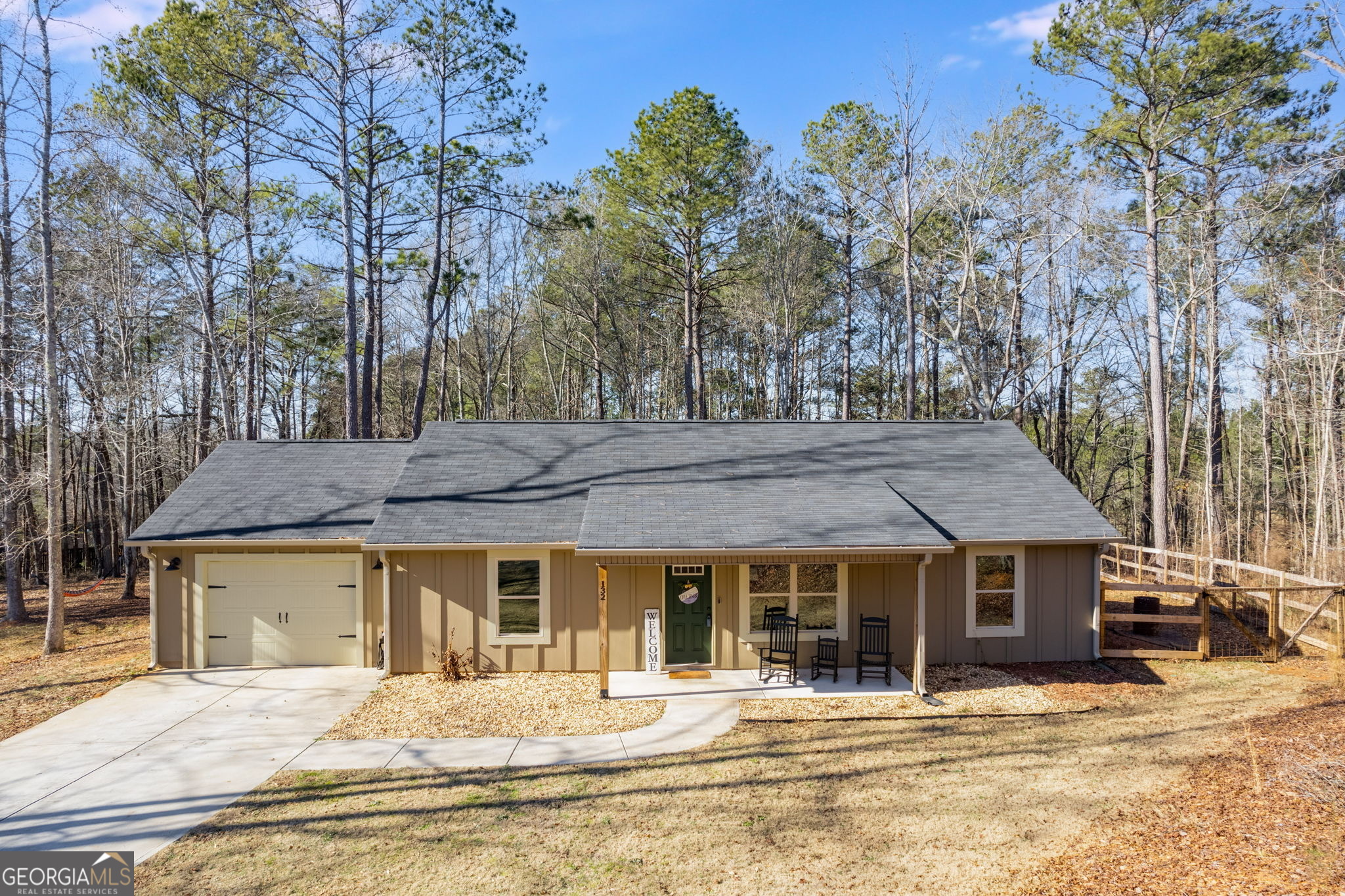 Welcome to 132 Pinnacle Way, a charming 3-bedroom, 2-bath home nestled on a beautifully maintained 0.6-acre lot in the heart of Carrollton, Georgia. This inviting residence features a spacious open-concept living area filled with natural light, perfect for both relaxing and entertaining. The modern kitchen offers ample cabinet space and updated appliances, while the primary suite boasts a private bath and generous closet space. Two additional bedrooms provide flexibility for family, guests, or a home office. Enjoy outdoor living with a well-maintained yard and a cozy patio, ideal for gatherings or quiet evenings. Conveniently located near local schools, shopping, and parks, this home combines comfort, style, and convenience-making it an excellent choice for your next move.
