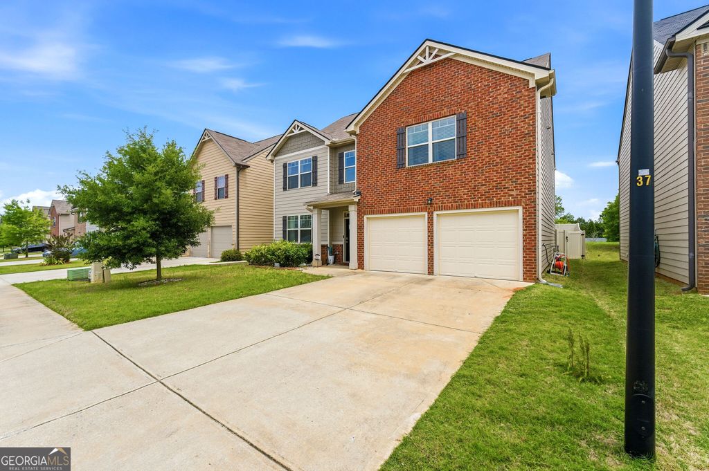 Photo of 505 Emporia Loop, McDonough, GA 30253 (MLS # 10765721)