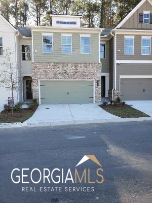 Great East Cobb Location, 5-year-old stunning two-story town home, offers an open-concept design with upgraded hardwood floors on the main level. The gourmet kitchen features quartz countertop, stainless appliances, and a large island perfect for your gatherings. The main level has a beautiful family room and sunlight dining area with view of your private backyard. Upstairs, the primary master suite offers a spacious retreat with a luxurious bathroom and walk-in closet, two additional bedrooms with a full bath. Community perks include a fire pit, gazebo and dog park, this house located just minutes from I-75, and Marietta Square.