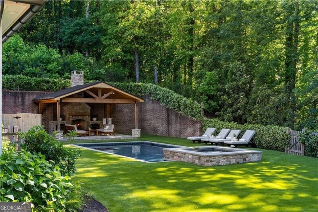 Photo of 5360 Lake Forrest Drive, Atlanta, GA 30342 (MLS # 10672990)