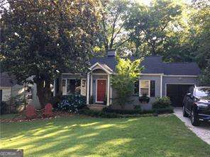 Located in the heart of popular Morningside, this darling 2-bedroom, 2-bath renovated bungalow offers the perfect blend of classic charm and modern comfort. Enjoy easy access to top-rated schools, amazing restaurants, boutique shopping, and nearby Piedmont Park-all just moments from your door.  Step inside to find all-new wood flooring and a beautifully redesigned open kitchen featuring marble countertops and stainless-steel appliances. The kitchen opens seamlessly to the family room, highlighted by a cozy fireplace, creating an inviting space ideal for entertaining or relaxing at home. The renovated master bath showcases elegant, contemporary details, while the second bedroom includes a custom built-in bed, maximizing both space and function.  A charming sunroom provides the perfect spot for morning coffee or a quiet retreat, and the basement offers excellent storage. Outdoors, enjoy the beautiful private wooded lot with multiple spaces to unwind-including a patio, deck, and landscaped yard-perfect for gatherings or peaceful evenings.  This move-in-ready Morningside gem combines thoughtful updates, warm character, and an unbeatable location in one of Atlanta's most desirable neighborhoods.