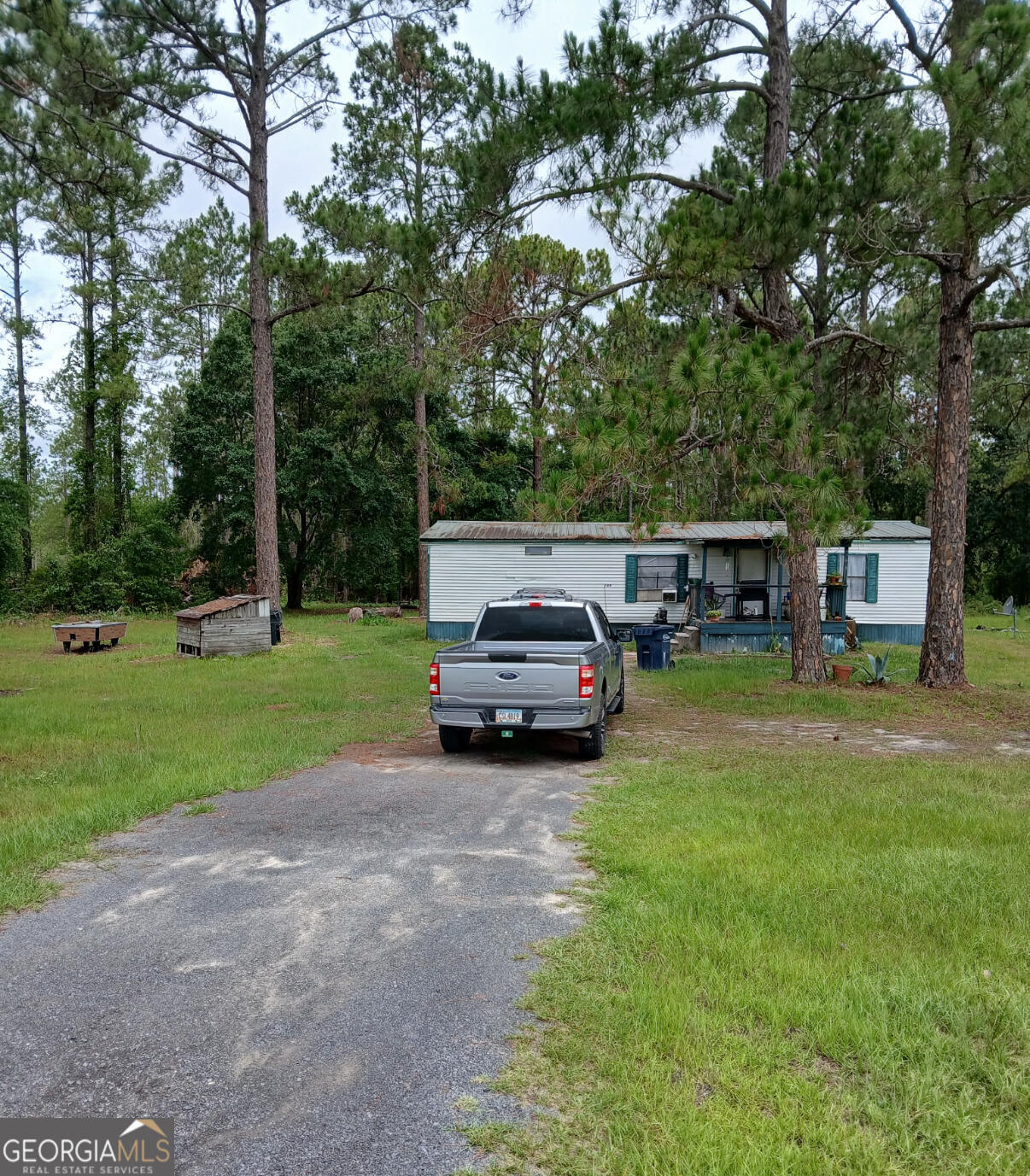 Discover this charming mobile home nestled in a serene location at 709 Spring Lake Dr, Folkston, GA. This property offers a spacious layout with comfortable living areas, appropriate for relaxation and entertaining. Enjoy the natural light that fills the home, highlighting its welcoming atmosphere. The property features a well-maintained exterior and a sizable yard, providing ample space for outdoor activities. Experience the tranquility and convenience of this delightful Folkston residence. Sold As-Is.