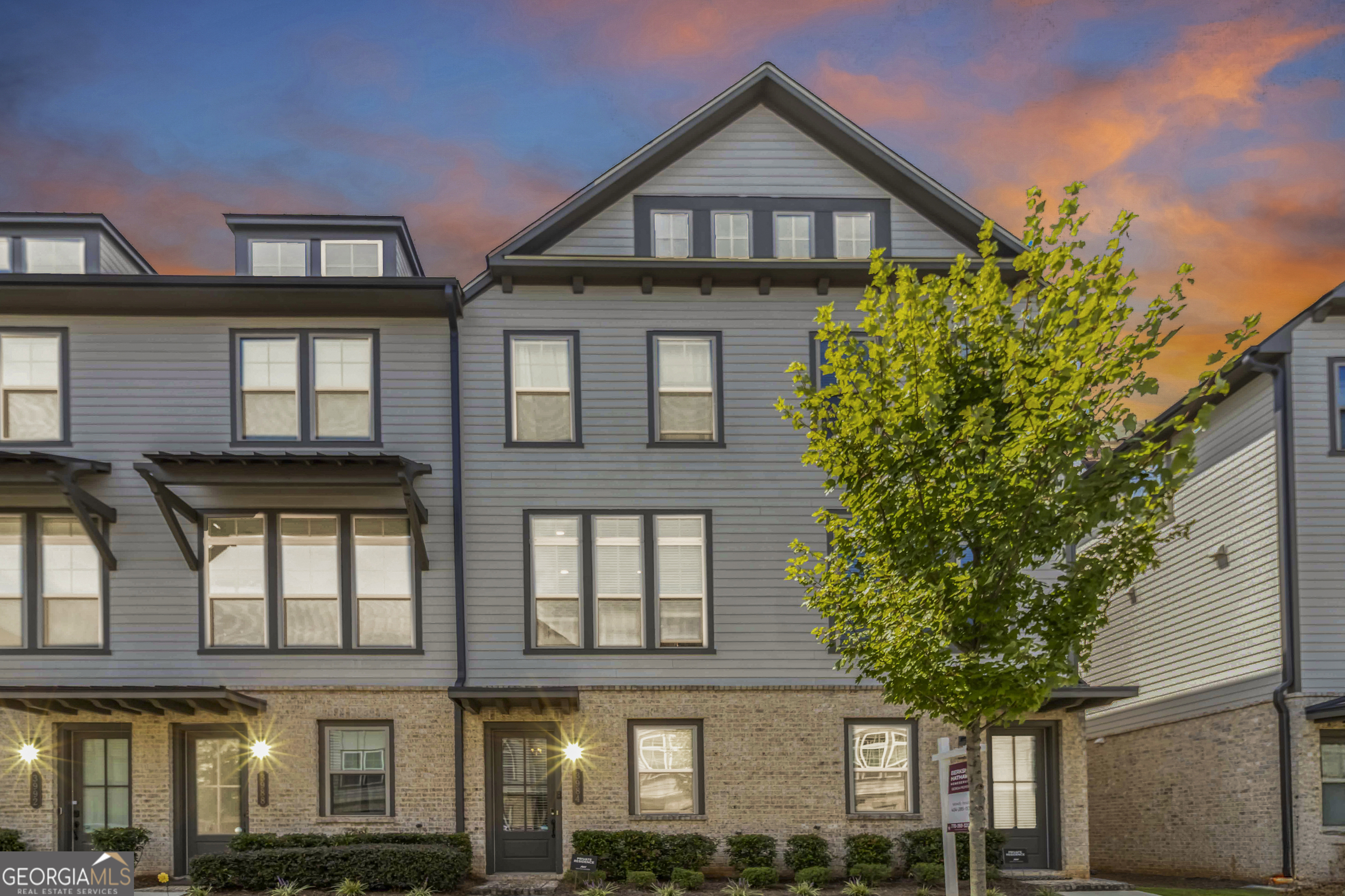 Welcome to Reverie on Cumberland, one of the area's most sought-after gated communities! This beautiful 3-bedroom, 3.5-bath townhome offers modern living in a prime location just minutes from fine dining, shopping, and entertainment. Upon entering, you'll find a private bedroom with a full bath on the terrace level-perfect for guests or a home office. The main floor features a bright and open living room with access to a balcony, ideal for morning coffee or evening relaxation. The gourmet kitchen is adorned with sleek stainless steel appliances, ample cabinetry, and a functional layout designed for both everyday living and entertaining. Upstairs, you'll discover another spacious secondary bedroom with an en-suite bath along with a conveniently located laundry closet. The owner's suite is a true retreat, featuring a spa-inspired bathroom with dual vanities, an oversized walk-in shower, and a generous walk-in closet. Enjoy resort-style amenities including swim, tennis, and a fitness center, all within this vibrant community. With easy access to major highways, The Battery, Truist Park, and more, this home truly has it all!