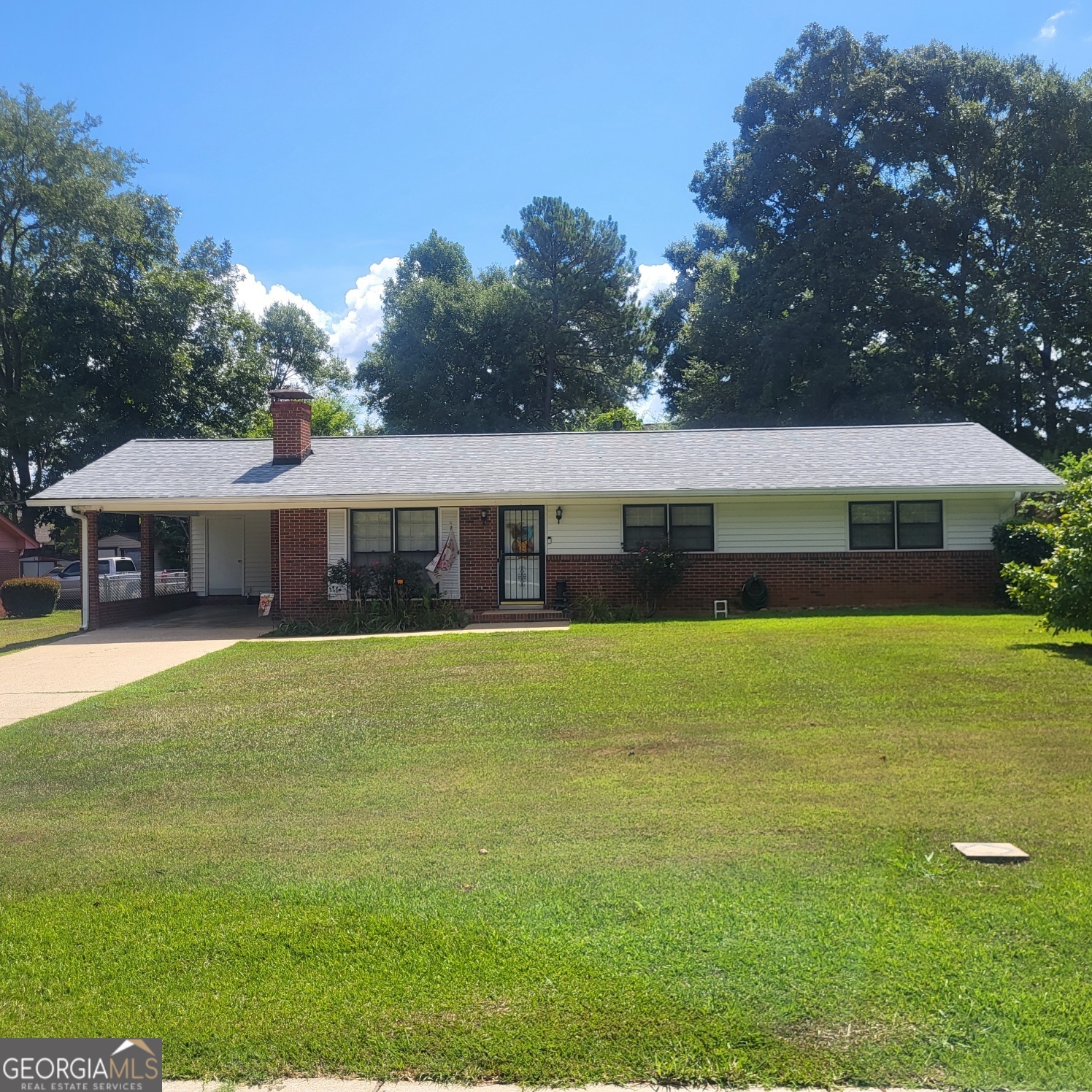 REDUCED! This Charming 3BR/2BA Brick Ranch-Style home in Valley is a Must-See! Home is approx. 1696 sq ft and features an open concept floor plan. The living room showcases hardwood floors and a gas log fireplace. The kitchen offers new flooring, a farmhouse sink, a large island, and built-in appliances. The spacious dining room includes built-in shelving and hardwood flooring. All bedrooms are generously sized with new carpeting and ceiling fans. Both bathrooms have been updated with new vanities and toilets. Additional updates include a new roof and gutters (Feb 2025), HVAC (2021), and a water heater (2023). The interior has been freshly painted, and some light fixtures have been updated. Enjoy the cheerful sunroom for extra living space. Outside, there's a single carport, a patio area, a fenced yard, and three storage buildings for additional storage. Conveniently located just minutes from I-85, shopping, and restaurants, this house is ready to impress. Schedule your tour today!