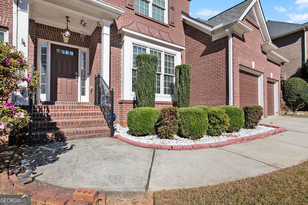 Photo of 870 Creekview Bluff Way, Buford, GA 30518 (MLS # 10625844)