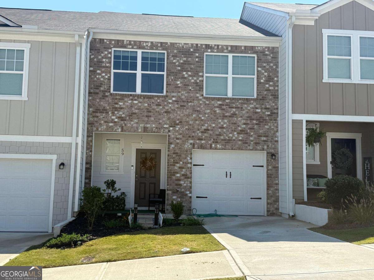 Welcome to this beautiful 3-bedroom, 2.5-bath home featuring an open-concept layout with a spacious kitchen complete with brand new stainless steel appliances and granite countertops that flow into the dining area and family room, with access to a private back patio perfect for relaxing or entertaining. The foyer offers convenient access to the one-car garage and a powder bath, while upstairs the primary suite includes a full bath and walk-in closet, two additional bedrooms share a full bath, and a laundry room with linen storage adds everyday convenience. Designed with energy efficiency in mind, this move-in ready home offers modern style, functional living, and the added benefit of no rental restrictions, making it an excellent choice for both homeowners and investors.