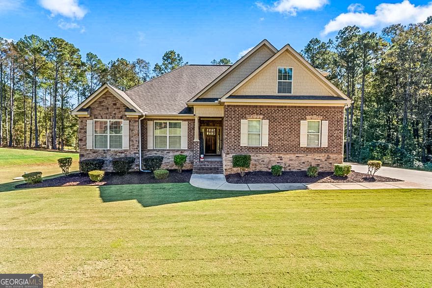 Stunning all brick ranch, 5 bedroom, 4 full bathrooms, on a full finished basement, situated on 1.20 acres in the highly sought after Ola School district! This home is perfectly placed off the road giving you plenty of yard in the front and back. Walk up to the covered front porch, enter into the wide foyer. The great room has high ceilings, brick fireplace and space for a large couch or sectional. Off the great room is a sunroom or a dining room that leads out to the back deck. The kitchen has an island, breakfast area, walk in pantry, hard surface counter tops, tile backsplash and stainless-steel appliances. The laundry room comes with the washer and dryer. The other side of the house features 2 guest rooms, guest bathroom and the master bedroom/ bathroom w/double trey ceiling, tiled bath w/garden tub, sep shower, dual sink vanity and a walk-in closet. Upstairs is a teen suit with a full bathroom and walk in closet. The finished basement has tons of room for entertaining or an in-law suite. The first room could be used as an office/ fitness or a living room. The next room has a partial kitchen including hard surface counter tops, tons of cabinets, tile backsplash, sink and a spot for a dining table. On the other side of the room there is a projector with plenty of space for your couches. The basement bedroom and bathroom are very large, including double sink vanity, tile shower, tile floors and walk in closet. Some added bonuses- lvp added to main floor, irrigation, additional parking pad, retaining wall, back deck redone and almost all of the land has been sodded and is very meticulously taken care of. Give me a call today to see this beautiful property.