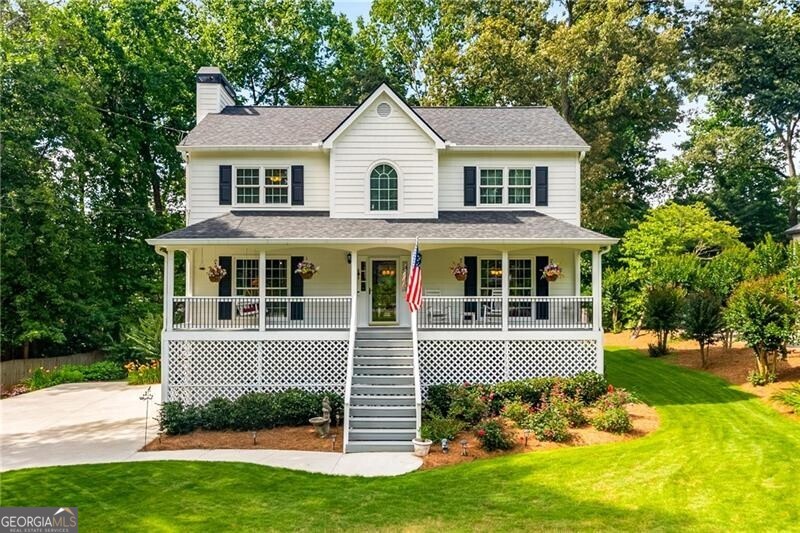 Welcome to 2401 Stockton Drive in Marietta! This is home is such a rare find; nearly 40 years old and still feels like new construction. Literally every major mechanical component has been replaced including roof, hardiplank siding, Marvin insulated energy efficient windows, new driveway, high-efficiency HVAC systems, water heater, new kitchen, fully irrigated front and back zoysia landscaping. The upgrades and care the owner has put into this home are just too many to list. The welcoming front porch is the first you will notice when you pull into the driveway. Through the front door, the freshly refinished white oak hardwood floors stand out immediately. On your left there is a generously sized family room centered by a gas fireplace. The new kitchen features quartz countertops, stainless steel appliances, custom wine rack, shaker cabinets and under-cabinet lighting. The sunroom is one of my favorite rooms in the house; connected to the open deck for grilling, it is the perfect place to relax and enjoy the peaceful quiet views of the lush backyard. Upstairs you will find 2 nicely sized guest rooms, guest bathroom and primary suite complete with walk-in closet and en-suite bath. There is more! The recently finished terrace level adds another huge room that could suit many different needs. Perfect playroom, second family room, office, or at home gym. There is so much to love about 2401 Stockton Drive but undoubtedly the landscaping and yard space this home offers is exceptional. Beautiful zoysia sod, hydrangeas, crepe myrtles, roses bushes, garden boxes, and storage shed/workshop with lighting and power to round it all out. As Metro Atlanta's real estate has becomes more and more expensive, $550k doesn't buy as much house as it used to. This home will leave you with the opposite impression. You'll be floored with everything you get here for the money. Exceptional value. Come visit us today, you will not be disappointed!