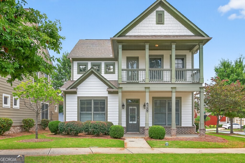 This gorgeous, move-in ready home with a master on the main is nestled just minutes from Suwanee Town Center! Step inside to a bright and inviting living space filled with natural light and upgraded plantation shutters. The kitchen features sleek granite countertops, stainless steel appliances, and plenty of cabinet and counter space for all your culinary needs. Upstairs, you'll find 3 spacious bedrooms, abundant storage, and your very own private balcony, the perfect spot to unwind and enjoy the outdoors. Master on the main lever features a spa-like master bath includes a zero-entry glass shower and walk in closets. Enjoy a low-maintenance lifestyle with an HOA that includes lawn care and pine straw, plus access to a community pool, playground, and dog park. With direct access to the Suwanee Greenway, you can easily explore nearby walking and biking trails, or stroll to Suwanee Town Center's shops and restaurants. Don't miss your chance to live in the heart of Suwanee!