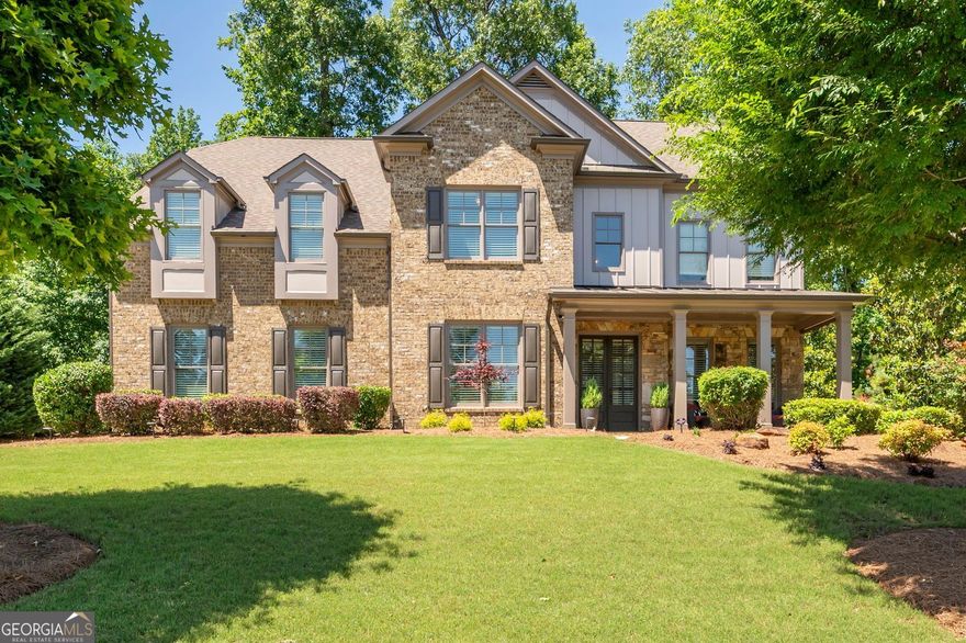 Welcome to an extraordinary home that captures the very essence of modern living, while harmoniously blending elegance, comfort and nature.  Situated in one of Marietta's premier neighborhoods, sought-after for it's location and top-rated schools.  As you approach this gorgeous meticulously maintained home, you are greeted by an inviting facade and covered front porch. The attention to detail on the interior is nothing short of breathtaking, featuring an open-concept layout that seamlessly integrates the dining, family room and kitchen spaces. To the front of the home is a flex room that can be used as an additional living space or home office.  The spacious family room is a haven for relaxation, with views to the private wooded backyard and oversized windows that allow abundant natural light to flood the room.  The elegant fireplace serves as a focal point, adding a cozy ambiance where family & friends can relax and create cherished memories.  The spacious kitchen is culinary artist's delight, equipped with top-of-of-line appliances that blend functionality with style. A generous island serves as both a workspace and a gathering place, making it perfect for entertaining guests or enjoying family meals.  Adjacent to the kitchen, the formal dining area creates an inviting atmosphere for hosting dinner parties and special occasions, accentuated by tasteful finishes and ample seating space.  Don't miss the spacious walk-in pantry and oversized laundry/mud room located to the rear of the kitchen. Retreat to the 2nd floor sanctuary that is the Primary Suite, a peaceful escape designed for comfort and tranquility. This lavish room features a spacious layout, complemented by plush carpeting and oversized windows that offer peaceful views of the outdoors. The master bathroom is a spa-like oasis, boasting dual vanities, a luxurious soaking tub, and a separate walk-in shower, creating a serene environment for daily indulgences. The four (4) secondary bedrooms are generously sized, each with unique features and ample closet space, ideal for family members or guests. The secondary bathrooms are thoughtfully designed with modern finishes and fixtures, ensuring convenience and style throughout the home.  Step outside to discover a captivating outdoor space that is perfect for entertaining or enjoying quiet moments of reflection. The cozy patio area is ideally suited for an intimate al fresco dining, accompanied by shady trees and the beautiful sounds of nature.  The lush greenery at the back, creates a private sanctuary that invites you to unwind and immerse yourself in the beauty of nature.   This residence is truly a one-of-a-kind, perfectly blending modern living with the comforts of home. It offers the perfect balance of sophisticated design and functional living spaces, making it an ideal choice for discerning buyers seeking elegance and comfort in every detail. Whether you are working from home, gathering with friends or enjoying intimate family moments, this home provides the backdrop for today's lifestyle. Don't miss this chance to make this exquisite residence your own and curate a life filled with comfort, elegance, and nature. Schedule your private tour today and prepare to be enchanted, as this property is more than just a house - it's a sanctuary where cherished memories await to be made.