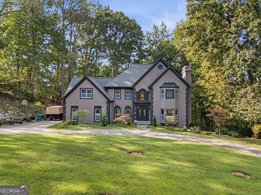 Beautifully renovated and updated home featuring a total of 8 bedrooms, 5.5 bathrooms, and 2 full kitchens! The main level offers high ceilings, a spacious living room, a sunroom, a painted big deck, plus a bedroom and full bath on the main floor - perfect for guests or in-laws. Upstairs includes a huge master suite with a fully updated master bath. The basement was recently finished, adding 3 additional bedrooms, a full bathroom, and its own kitchen, ideal for guests or rental potential. Updated bathrooms throughout. No HOA and plenty of space for everyone!