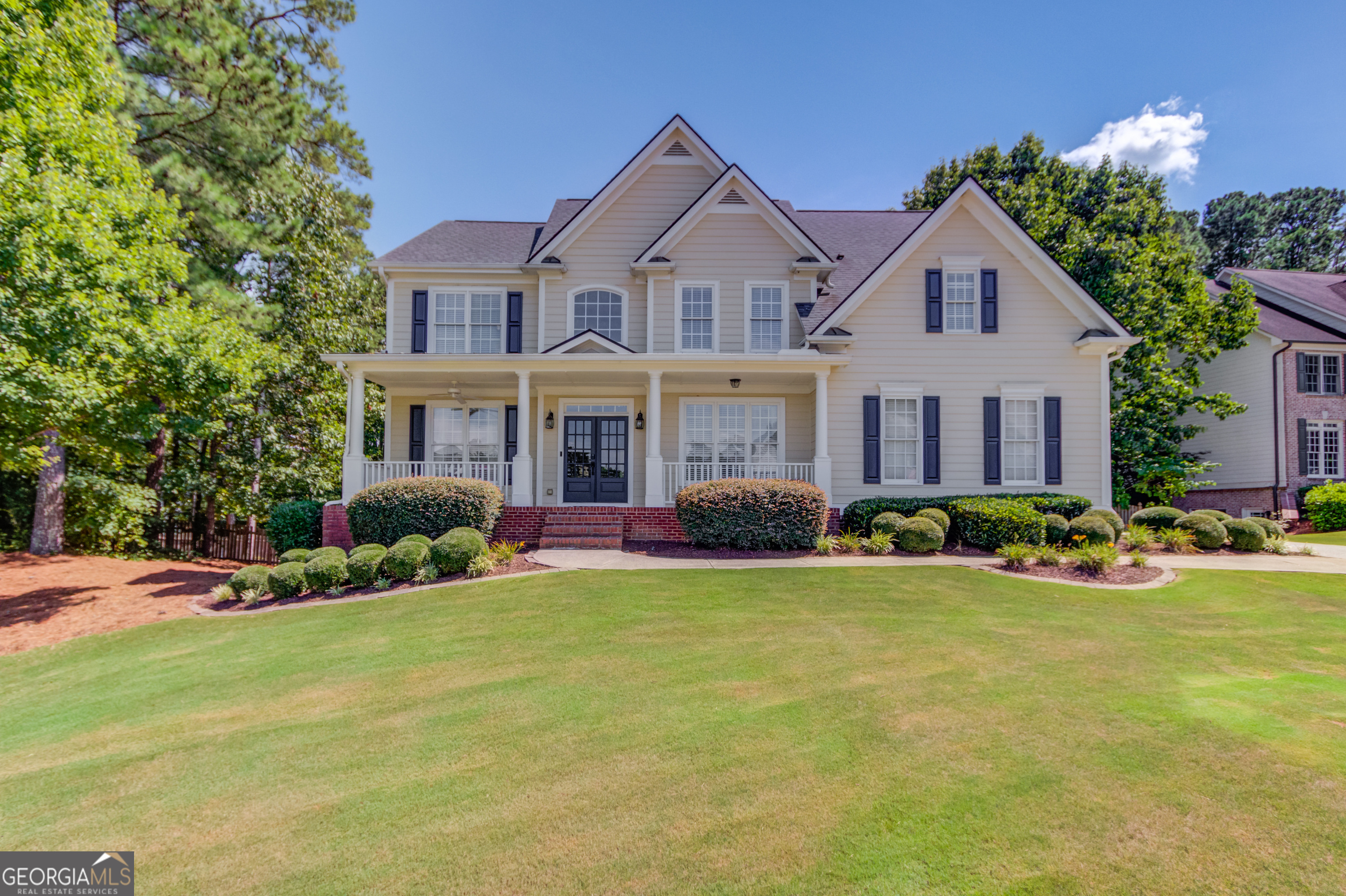 Your Private Oasis Awaits in One of Georgia's Most Coveted Communities! This spacious 5-bedroom, 5-bathroom gem with TWO flex spaces and a movie room in the finished basement is located in one of Georgia's most sought-after school districts and offers the perfect combination of luxury, comfort, and convenience. Lovingly maintained by the original owners, this move-in ready home features major upgrades including a new HVAC unit, newer roof, and newer water heaters, providing peace of mind and efficiency for years to come. You don't want to miss this private backyard oasis - a true entertainer's dream! Enjoy summer days by the sparkling pool, unwind on the gorgeous deck, and take in the professional landscaping and lighting that brings the space to life. The fenced backyard offers privacy and security, perfect for pets and play. Just off the pool, step inside to a convenient space featuring a kitchenette and a wine fridge. This space is ideal for storing all your drinks, snacks and pool accessories. Located on a private corner lot in this desirable swim/tennis community, this home offers access to golf, clubhouse, pickleball, tennis and resort-style amenities. Enjoy quick access to I-85, the Mall of Georgia, and endless shopping, dining, and entertainment options - all while coming home to peace and privacy. Don't miss your chance to own this exceptional home that truly has it all - space, upgrades, location, and community!