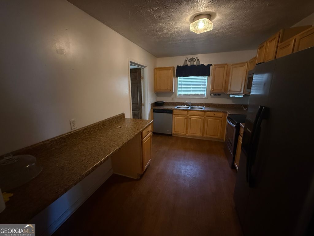 Photo of 1236 Woodbridge Drive NE, Conyers, GA 30012 (MLS # 10655576)