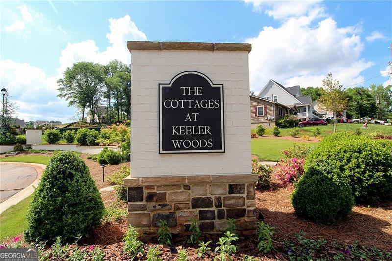 Exceptional opportunity to build your dream custom home in the exclusive gated community of The Cottages at Keeler Woods. With only 27 lots and nestled in the heart of Marietta, this prime enclave offers a premier location, less than 2 miles from Historic Marietta Square and steps from the scenic hiking trails of Kennesaw Mountain. Custom homes are to be designed by Caldwell-Cline Architects and built by Elliott Custom Homes, ensuring reputable quality. The owner has an impressive plan drawn for this lot available for purchase, or choose another Caldwell-Cline design, or design your own. This gorgeous lot offers additional green space perfect for a pool or outdoor family activities. Relax with friends around the charming community fire pit and pergola. Award-winning public and private schools, shopping, hospitals and highways just minutes away. Welcome Home.