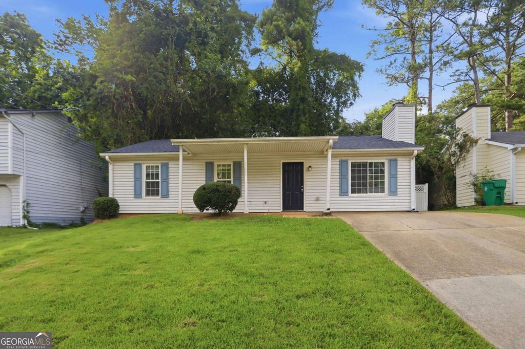 Photo of 5202 Scarbrough Lane, Stone Mountain, GA 30088 (MLS # 10791645)
