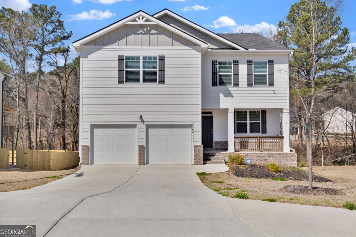 ***PRE-FORECLOSURE**Discover this stunning 4-bedroom, 2.5-bathroom home, perfectly situated near Hartsfield-Jackson Airport, major highways, and downtown Atlanta. This newly built luxury home offers modern living with an open-concept design, featuring a spacious island kitchen, sleek white cabinetry, and granite countertops that flow seamlessly into the breakfast area and family room-ideal for entertaining. Primary suite w/ a spa-like bath and large secondary bedrooms, providing ample space for relaxation. Located in a quiet neighborhood enjoy easy access to top dining, shopping, and attractions like the Porsche Experience Center and Delta Headquarters. This home is perfect for corporate housing, traveling professionals, or anyone needing extra space. **EV CHARGER READY** Don't miss out on this incredible rental opportunity-schedule your tour today! 100% Financing Eligible! SOLD AS IS - SUBJECT TO 3rd Party APPROVAL. BELOW APPRAISED VALUE.