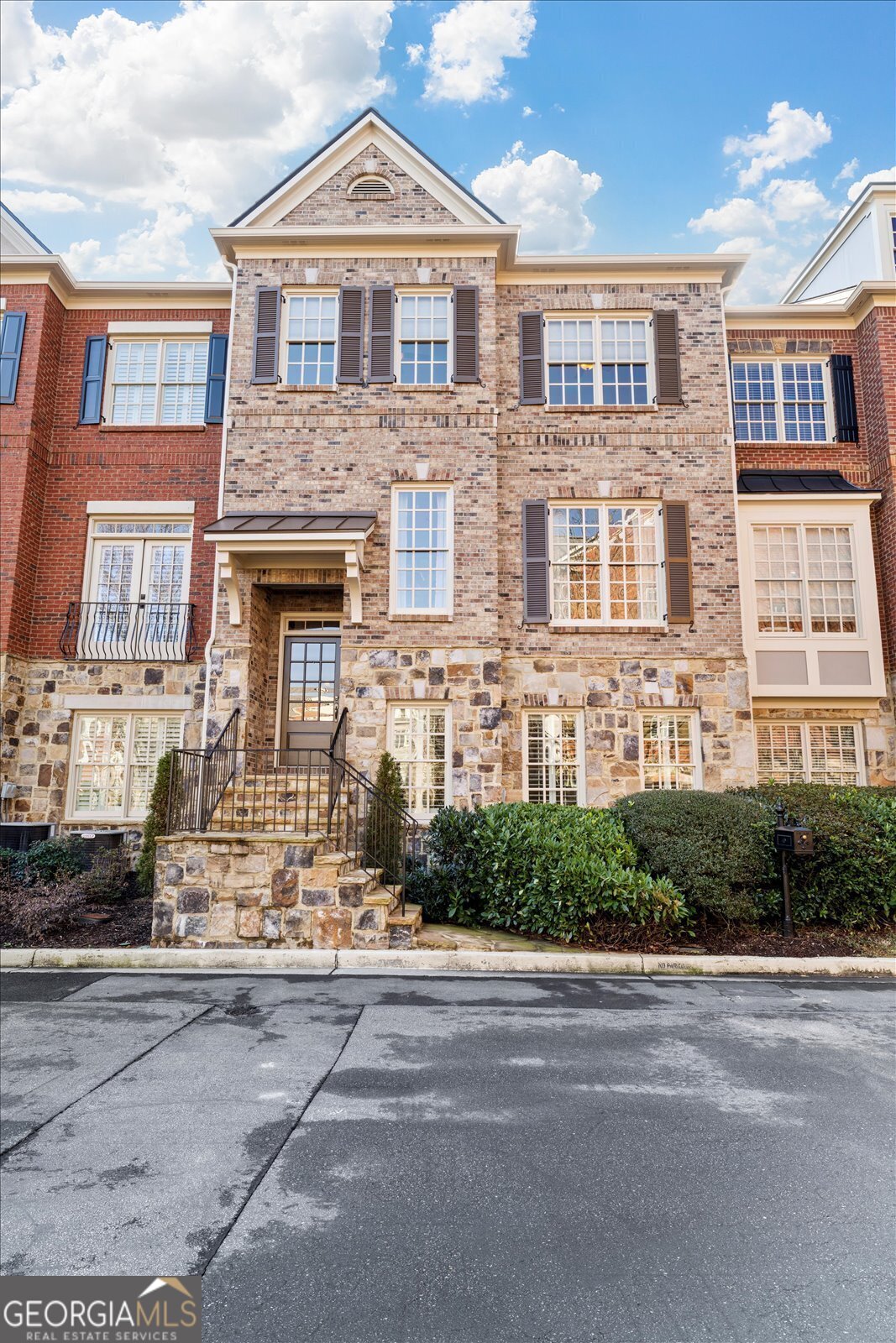 Experience the best of Marietta living in this distinctive, European-inspired townhome perfectly positioned for a life of leisure and convenience. Simply stroll across Kennesaw Avenue to explore the breathtaking walking and biking trails at Kennesaw Mountain National BattlefieldCoyour own gateway to outdoor adventure. Before or after your morning excursion, swing by Basecamp for a quick bite or leisurely lunch, then head just a few minutes further to enjoy the shops, dining, and entertainment of historic Marietta Square. Inside, discover a home that marries the spaciousness of a single-family residence with the low-maintenance benefits of a townhome. Fresh Paint and beautiful hardwood floors flow through the generous living and dining area, complemented by a well-organized kitchen. A sunroom on the main floor doubles as a perfect home office or a cozy reading nook, complete with a covered porch for savoring your morning coffee or unwinding at dayCOs end. Upstairs, new carpet in the primary suite serves as a private retreat, offering a walk-in shower, upgraded bidet toilet seat, and an additional sunroom/sitting area. Step out onto your second covered porch to bask in the fresh air or catch up on reading. Another bedroom, a full bath, and a conveniently located laundry room round out the third floorCowhere brand-new carpeting awaits for a crisp, updated feel. On the lower level, transform the oversized space into a third bedroom, entertainment room, or in-law suite. A ventless gas stove, full bath, and walk-in closet ensure comfort for guests or family members, and newly installed carpeting adds a polished touch. From its inviting layout to its unbeatable locationCojust minutes from Barrett Parkway, Wellstar Kennestone Hospital, and the vibrant Marietta SquareCothis exceptional townhome caters to those seeking a walkable, stress-free lifestyle with a dash of outdoor thrill. Make it yours and experience the perfect blend of nature, dining, and local culture!
