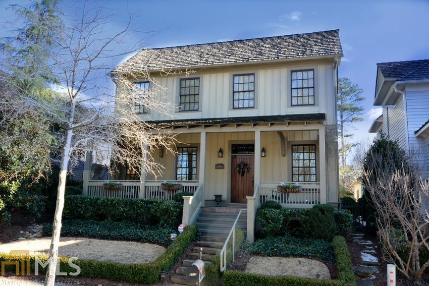 OPEN HOUSE 1/25/15 2PM - 4PM! Welcome home to Vickery! This exquisitely crafted home designed by Hedgewood Home features ALL the details you would expect from a million dollar home. Waterworks faucets thruout, wood planked walls, hardwoods on main, designer light fixtures & much more! This home boasts formal Living Room, Dining Room, fireside Family Room, & gourmet kitchen with Five star professional appliances. Master on main with spa bath, frameless shower with dual heads & separate tub. 2 beds up with walk in storage. Finished guesthouse above garage with private entry! Screened porch with fence yard & koi pond. Great Location across from park!