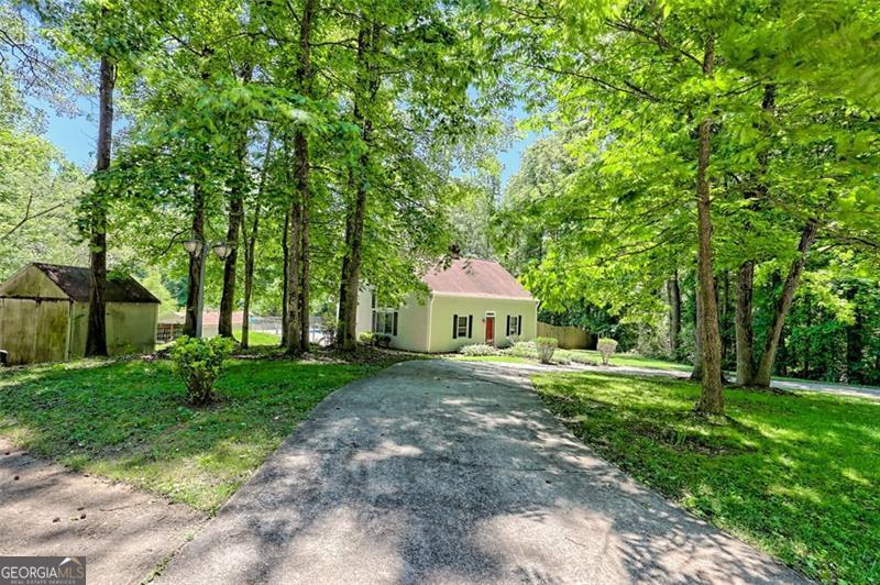 Welcome Home! This 4 Bed/3 Bath property has everything! Need Privacy? This serene retreat is situated on 2 parcels, spanning a total of 2.58 acres. Need to cool off? Take a dive into the swimming pool! Need storage space? This property boasts a storage shed and a 26x40 pole barn which can be utilized for RV Storage, parking cars, and/or a workshop. Don't miss an opportunity at an amazing piece of property at an incredible price!