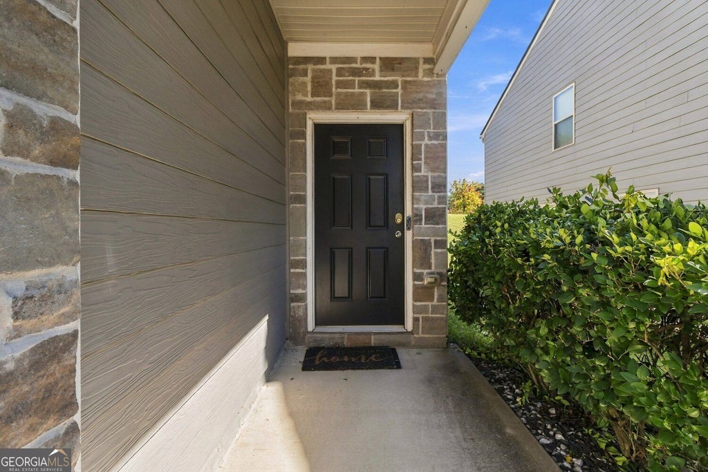 Photo of 5880 Seabright Lane, Atlanta, GA 30349 (MLS # 10855374)
