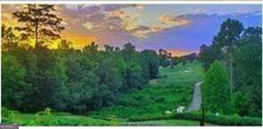 Wow!!! This Incredible 2.2 Acre Corner Private Corner DOUBLE LOT on a Cul De Sac with a picturesque pond and tree lined views in the prestigious gated Manor Golf and Country Club and the award-winning Milton School system is now available for your new custom dream home. This gorgeous grand estate home site is a rare gem with easy access to the incredible in community Tom Watson designed championship golf course and offering natural preserve views while being easily walkable to the country club, indoor and outdoor pools, indoor and outdoor tennis courts, sports courts, multiple restaurants, gym, spa, golf shop and more so you can appreciate resort styled living at its best every day! With this expansive private estate lot, your dream custom home can be a reality. There's no place like home when you Live in The Manor Golf and Country Club and no other home site like this one saved for last!