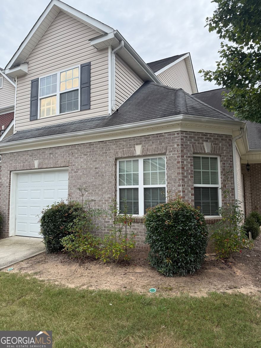 Welcome to Unit 1705 of 2555 Flats Shoals Rd, a well kept 3-bedroom, 2.5-bathroom home offering exceptional space and storage in a great Atlanta location. This 3-sided brick beauty is situated in a quiet community and boasts an abundance of features for both comfort and play. Step into the cozy family room flanked by a eat in kitchen featuring a new stainless steel refrigerator, butcher block counter top and new sink and faucet, perfect for hosting gatherings.  The kitchen seamlessly flows into the family room, creating an ideal space for entertaining. Downstairs, the primary suite impresses with a spacious walk-in closet, a garden bath tub, separate shower, and double vanity. Upstairs 2 additional bedrooms with spacious closets and a bathroom to share.  Outside, enjoy the partially private patio area overlooking the backyard, ideal for grilling. With fresh interior paint and its convenient location near shopping, major interstates, and Hartsfield-Jackson International Airport, this home is move-in ready and waiting for you. Don't miss this rare opportunity to own a spacious, beautifully updated property in Atlanta. Schedule your showing today!