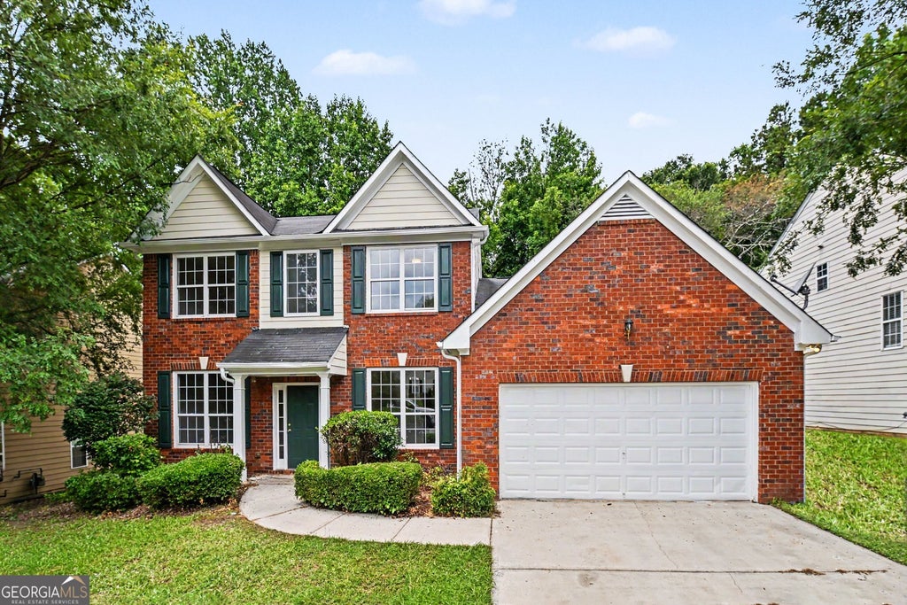 Photo of 320 Magnolia Walk Lane, Atlanta, GA 30349 (MLS # 10789539)