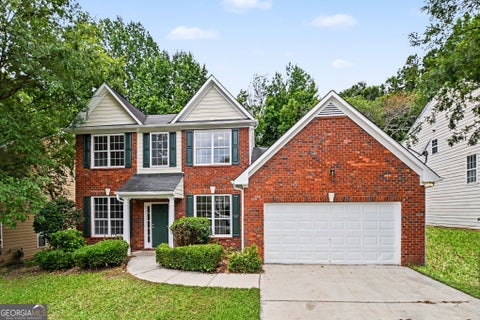 Photo of 320 Magnolia Walk Lane, Atlanta, GA 30349 (MLS # 10789539)