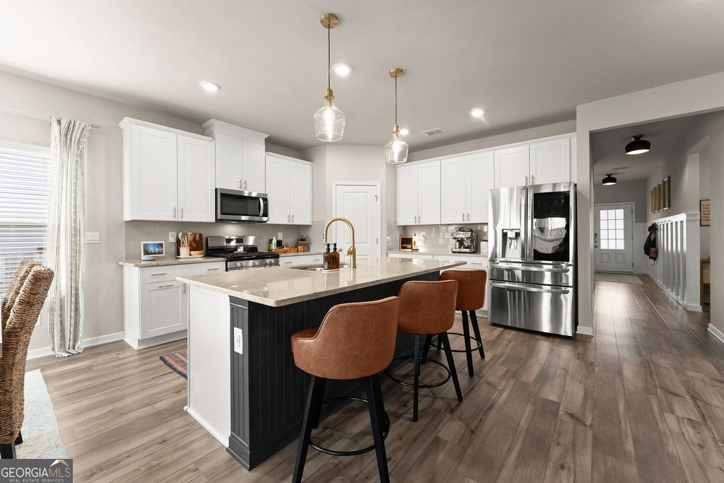 Photo of 409 Murphy Avenue, Canton, GA 30114 (MLS # 10872948)