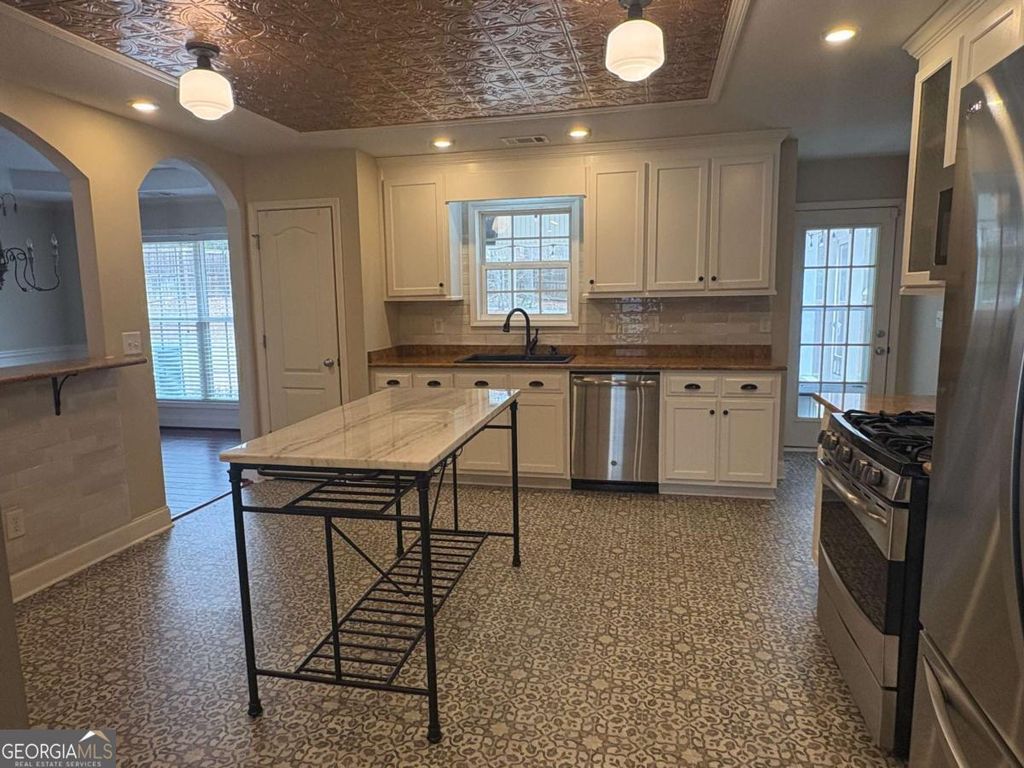 Photo of 616 Embassy Walk, Winder, GA 30680 (MLS # 10702441)