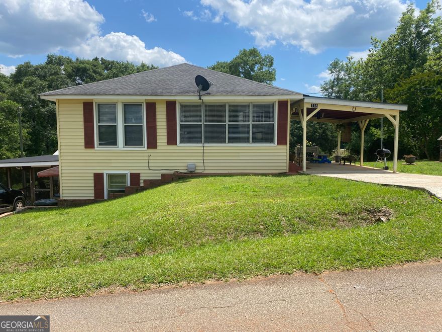 This charming multi-generational home in Thomaston has just had a price improvement below current appraisal!!Due to the family job relocating to another state. Don't miss out on this well-maintained little gem!!  Come take a look in person at this sweet home nestled in the heart of Thomaston, Georgia! This well maintained 3-bedroom, 2-bathroom residence is perfect for families seeking space and versatility. Whether you're looking for a cozy family haven or a multi-generational living arrangement, this property offers it all. As you step inside, you'll be greeted by an inviting layout that effortlessly balances comfort and functionality. There are two fully equipped kitchens. One on the main floor and a recently remodeled kitchen in the basement along with a recently remodeled bathroom in the basement. The main living area flows seamlessly into a spacious kitchen featuring an impressive island-perfect for casual dining or entertaining guests. Whether you're whipping up family meals or hosting friends, this kitchen will surely inspire culinary creativity!  One of the standout features of this home is the second kitchen located in the finished basement. This flexible space allows for extra convenience when hosting gatherings or is great for an in-law suit equipped with a remodeled bathroom. The basement also has a bedroom with walk in closet and another living area, that could be used as a bonus room or family room. Another feature I absolutely love is the storm shelter area in the basement surrounded with concrete walls that brings peace of mind with any bad storms that may come along.  There is outdoor access as you step outside onto the expansive screened-in porch in the basement, where you can sip your morning coffee. The gentle sounds of nature enhance this peaceful retreat-perfect for relaxation!  The exterior features not one but two outbuildings that provide ample storage or workshop possibilities. Outside there are 6 blueberry bushes along with vines of fresh muscadines. The sellers absolutely love their home, but her husband's job relocated him to another state. This sweet home is located at the end of a quiet dead-end street. Come take a look in person.  Grab your favorite realtor today and set up a showing and as always, if you don't already have a realtor, I will be more than happy to assist you.