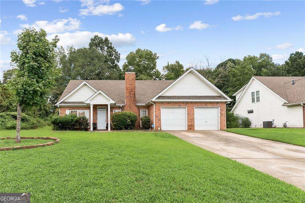 Welcome to 11203 Knotty Pine Place, a stepless ranch home brimming with potential and ready for your vision. Nestled in a quiet community with no HOA, this home is just a short walk to Lovejoy High School, Lovejoy Regional Park, and the Clayton County Library branch, plus minutes away from shopping and everyday conveniences. Step inside to discover a spacious vaulted family room with a cozy fireplace at its heart, setting the tone for comfortable living. The large eat-in kitchen offers abundant cabinet space with direct access to the backyard, ideal for entertaining, gardening, or creating your own private retreat. The generous owner's suite boasts a double vanity, separate tub and shower, and walk-in closet, making it a true retreat at the end of the day. Two additional bedrooms are situated on the opposite side of the home, giving everyone privacy and space to spread out. Outdoors, the fenced backyard provides a blank canvas for everything from family gatherings to future landscaping projects. Though this home does need TLC, the solid layout and desirable features make it a fantastic investment opportunity. With some updates and creativity, you can uncover serious value and transform this property into a beautiful place to call home or a profitable addition to your portfolio. Sold As-Is. Don't miss this investor special in the heart of Hampton, schedule your showing today!