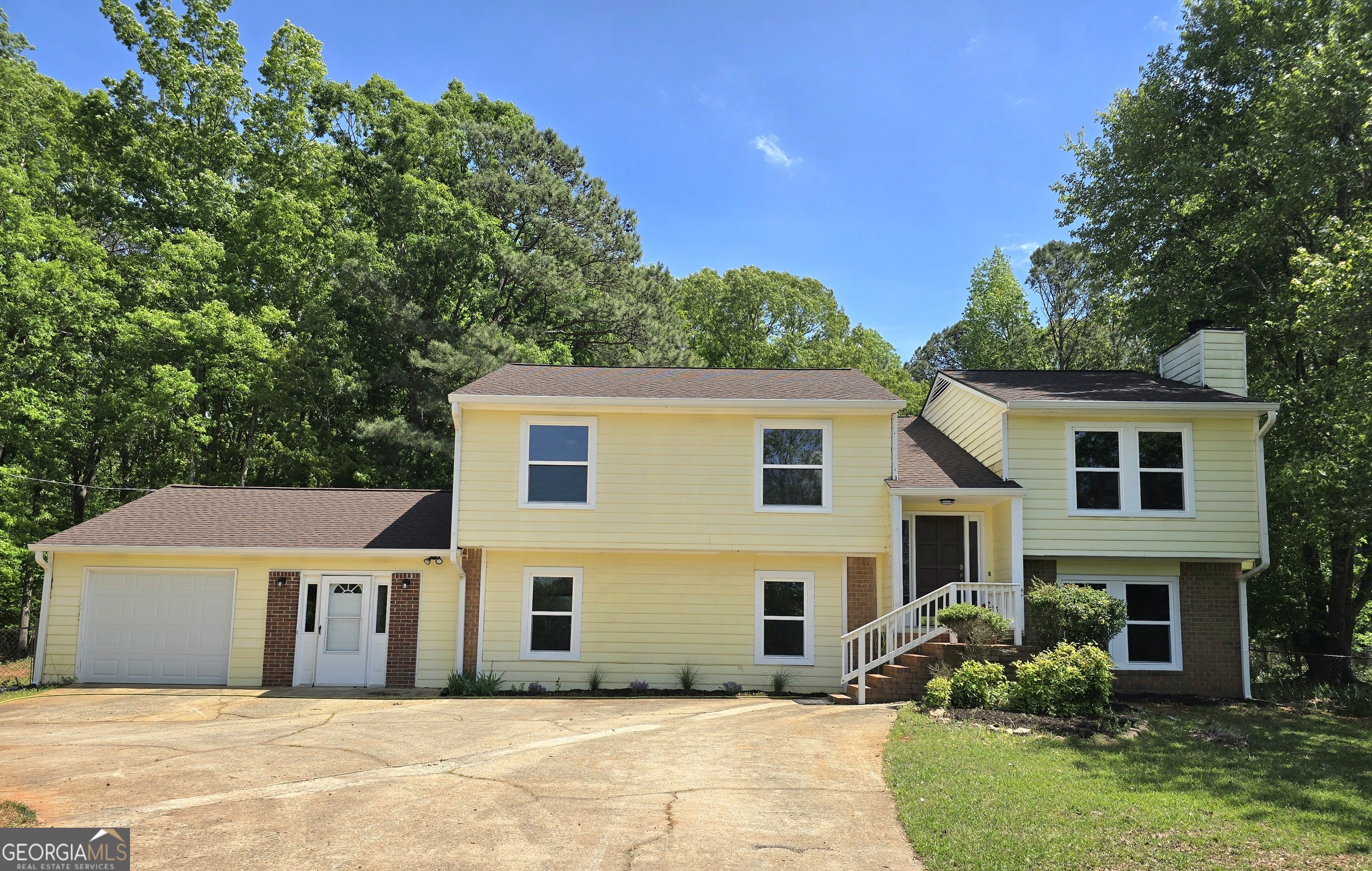 Completely updated 5-bedroom, 3 & 1/2 bath home which includes an attached 1-bedroom 1-bath in-law or teen suite features include an updated bright white Kitchen with granite countertops, new appliances, separate family room, additional dining area, large bedroom with massive walk-in closets, and on on-suite bath as well as a sunroom. Private entrance separate from the main house.. The main house has Fresh paint, new flooring, new kitchen appliances and countertops, and updated bathrooms. Open and spacious floorplan with Island Kitchen, dining area, and a Large great room with cozy fireplace. The main bedroom features an updated en-suite bath. Secondary bedrooms are large with direct access to a hall bath, and the basement has a massive flex room that could be a fourth bedroom. secondary family room/ entertainment space with an attached half bath. ample parking for several vehicles. Highly desirable area in the Whitewater School District. Ideal location near Downtown Fayetteville, Triith Studios, the new Data Center, and the new US Soccer stadium. Please request all appointments through ShowingTime.