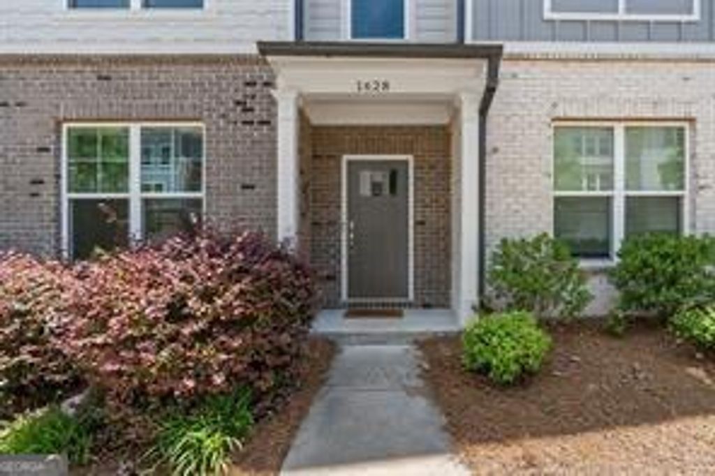 Photo of 1628 Venture Point Way, Decatur, GA 30032 (MLS # 10760572)